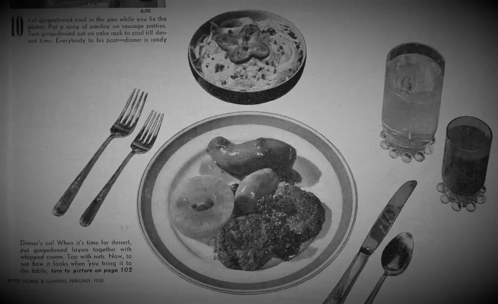 A black and white photo of how a vintage 30-minute dinner looks when it is served.